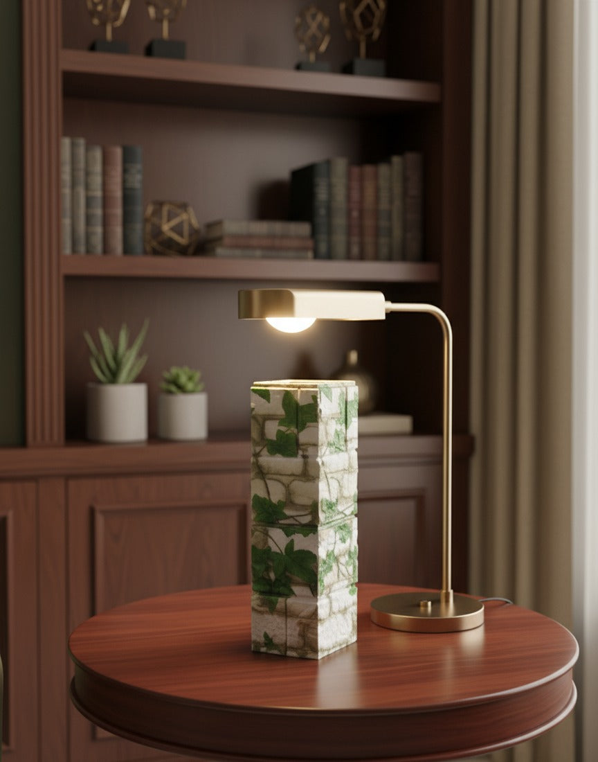 Ivy green and white mosaic wooden column vase on a round walnut table
